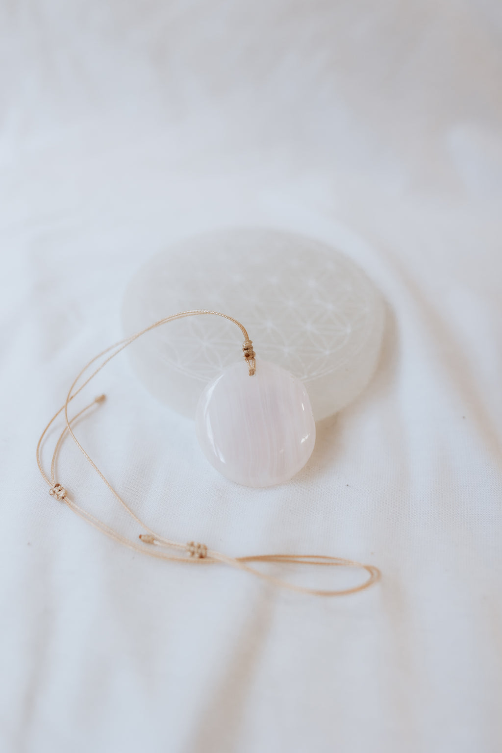 Mangano Calcite Crystal Pendant | Compassion • Healing • Nurturing