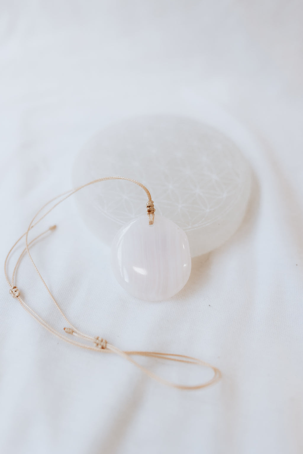 Mangano Calcite Crystal Pendant | Compassion • Healing • Nurturing
