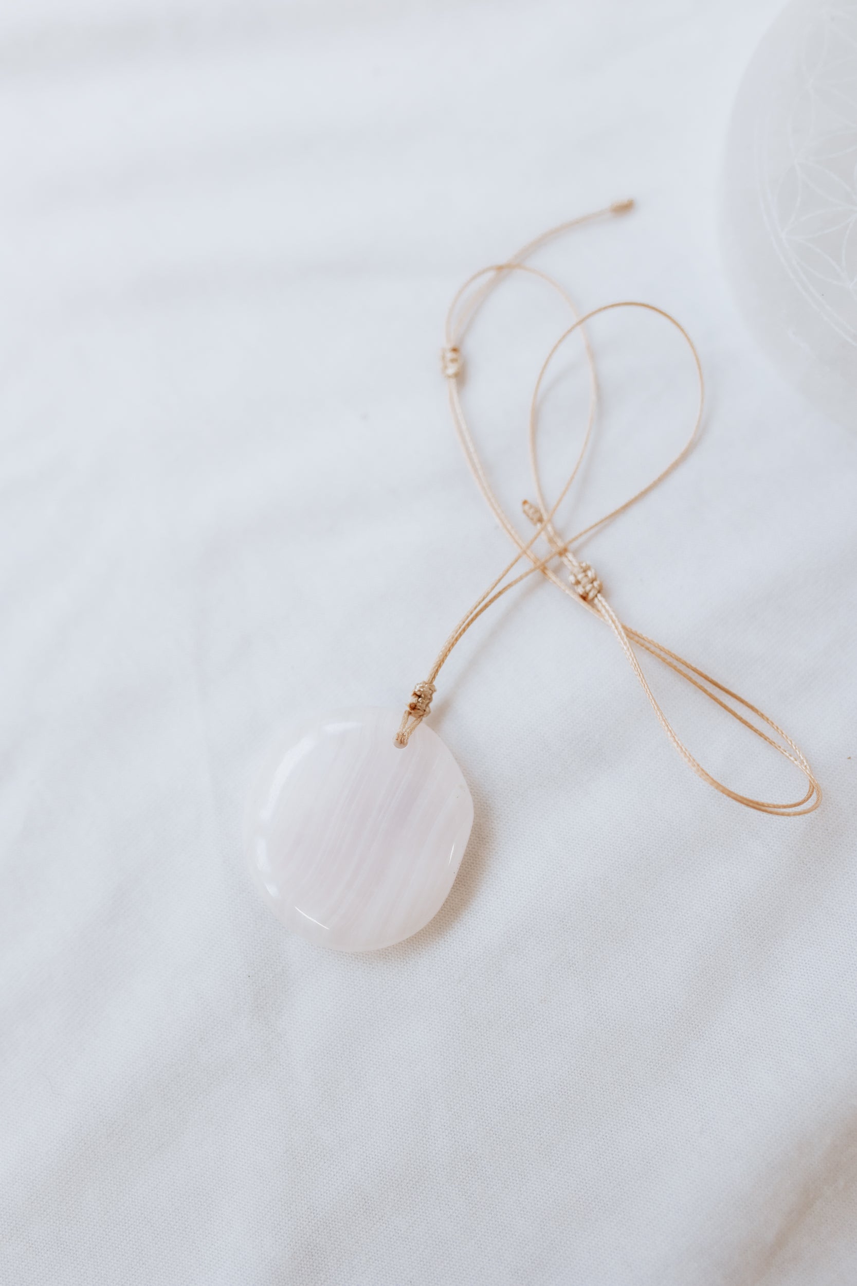 Mangano Calcite Crystal Pendant | Compassion • Healing • Nurturing